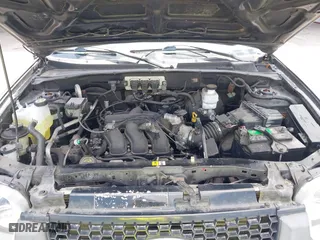 2005 Ford Escape XLT with VIN 1FMYU03175KD53760, listed as a IAAI auction lot 42124876 with 158,706 mi miles. Bid and sale history available at carsss.com. Image 10.