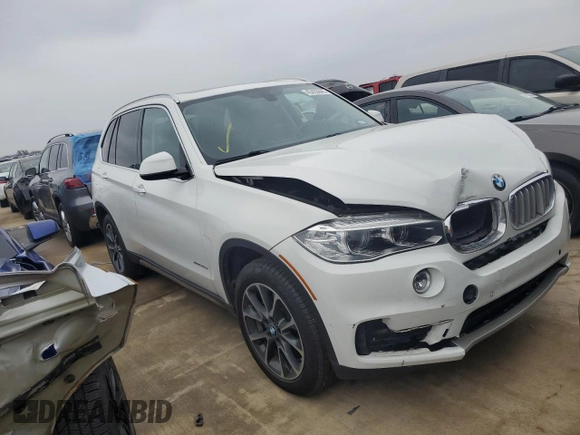 2014 BMW X5 xDrive35d with VIN 5UXKS4C55E0J97089, listed as a Copart auction lot 43455645 with 126,736 mi miles and Salvage Title. Bid and sale history available at carsss.com. Image 4.