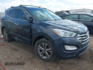 2016 Hyundai Santa Fe z VIN 5XYZU3LB0GG320420, wystawiony jako IAAI lot #41526736 z przebiegiem 163 214 mil mil oraz . Historia ofert i sprzedaży dostępna na DreamBid. Obrazek 1.
