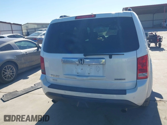 2012 Honda Pilot Touring with VIN 5FNYF3H91CB020673, listed as a IAAI auction lot 41721836 with 123,607 mi miles and . Bid and sale history available at carsss.com. Image 16.