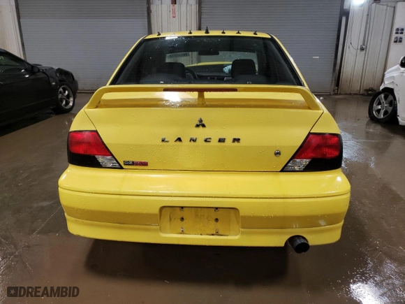 2002 Mitsubishi Lancer OZ-Rally with VIN JA3AJ86E32U051909, listed as a Copart auction lot 80555514 with 237,923 mi miles and Salvage Title. Bid and sale history available at carsss.com. Image 6.