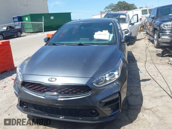 2021 Kia Forte GT-Line z VIN 3KPF34AD2ME341973, wystawiony jako IAAI lot #42084462 z przebiegiem 61 542 mil mil oraz . Historia ofert i sprzedaży dostępna na DreamBid. Obrazek 12.