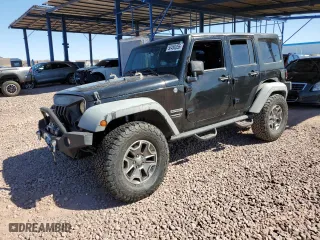 2012 Jeep Wrangler Unlimited Sport with VIN 1C4BJWDGXCL161569, listed as a Copart auction lot 50456355 with 133,703 mi miles and Salvage Title. Bid and sale history available at carsss.com. Image 1.