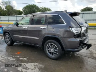 2018 Jeep Grand Cherokee Limited with VIN 1C4RJEBG1JC300335, listed as a Copart auction lot 61853325 with 107,137 mi miles and Salvage title. Bid and sale history available at DreamBid. Image 2.
