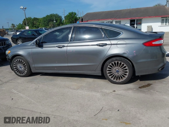 2014 Ford Fusion Titanium with VIN 3FA6P0K90ER358536, listed as a IAAI auction lot 41931474 with 170,856 mi miles. Bid and sale history available at carsss.com. Image 15.