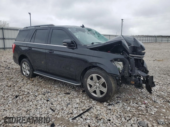 2020 Ford Expedition XLT with VIN 1FMJU1JT5LEA05768, listed as a Copart auction lot 50335285 with 131,422 mi miles and Salvage title. Bid and sale history available at DreamBid. Image 4.