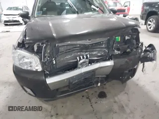 2006 Mercury Mariner Luxury с VIN 4M2CU56126KJ03006, выставлен на аукционе IAAI как лот 42476543 с пробегом 114 288 миль миль и . История ставок и продаж доступна на DreamBid. Изображение 6.