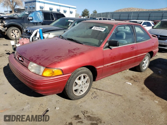 1996 Ford Escort z VIN 1FASP11J0TW138176, wystawiony jako Copart lot #82435494 z przebiegiem 62 107 mil mil oraz Czysty tytuł • Clean title. Historia ofert i sprzedaży dostępna na DreamBid. Obrazek 1.