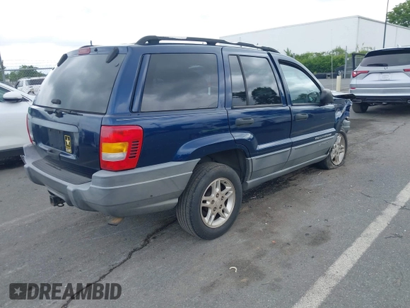 2002 Jeep Grand Cherokee Laredo with VIN 1J4GX48S02C125258, listed as a IAAI auction lot 42388724 with 295,270 mi miles and . Bid and sale history available at DreamBid. Image 4.