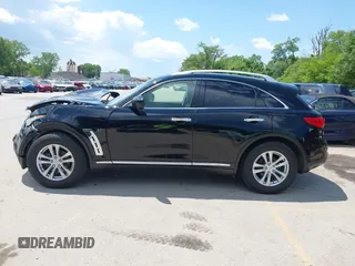 2015 Infiniti QX70 with VIN JN8CS1MW1FM482625, listed as a IAAI auction lot 42332365 with 88,912 mi miles and . Bid and sale history available at DreamBid. Image 14.