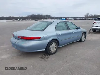 1997 Mercury Sable GS z VIN 1MELM50U5VA652727, wystawiony jako IAAI lot #41701998 z przebiegiem 213 563 mil mil oraz . Historia ofert i sprzedaży dostępna na DreamBid. Obrazek 4.