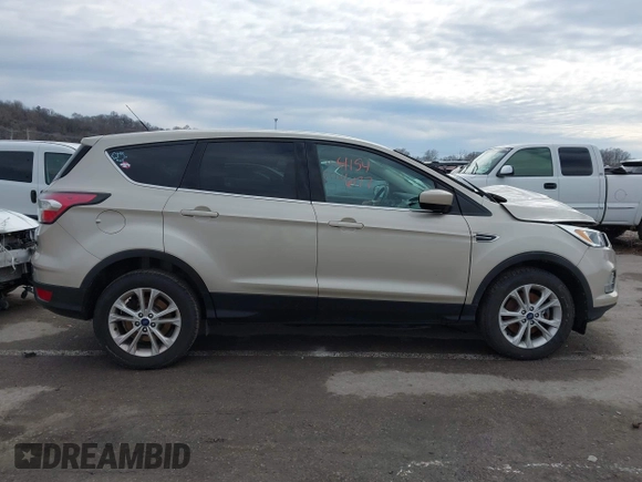 2017 Ford Escape SE with VIN 1FMCU9GD1HUB28732, listed as a IAAI auction lot 41546177 with 126,698 mi miles and . Bid and sale history available at DreamBid. Image 13.