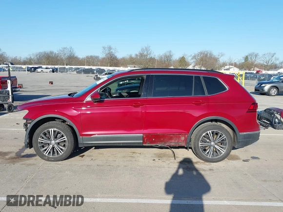 2018 Volkswagen Tiguan SEL z VIN 3VV2B7AX6JM039344, wystawiony jako IAAI lot #41934536 z przebiegiem 93 838 mil mil oraz . Historia ofert i sprzedaży dostępna na DreamBid. Obrazek 15.