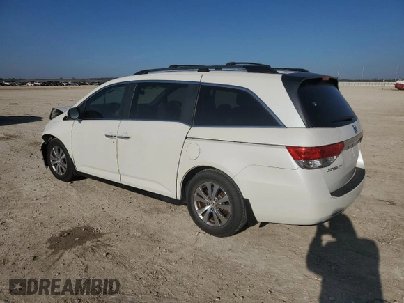 2014 Honda Odyssey EX-L with VIN 5FNRL5H67EB098473, listed as a Copart auction lot 45670685 with 163,765 mi miles and Salvage Title. Bid and sale history available at DreamBid. Image 2.