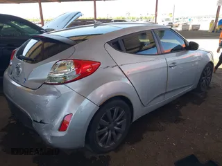 2012 Hyundai Veloster w/Black Int z VIN KMHTC6AD2CU052067, wystawiony jako IAAI lot #42261316 z przebiegiem 187 234 mil mil oraz . Historia ofert i sprzedaży dostępna na DreamBid. Obrazek 4.