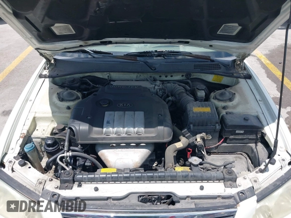 2002 Kia Optima LX z VIN KNAGD126325144218, wystawiony jako IAAI lot #42596691 z przebiegiem 220 972 mil mil oraz . Historia ofert i sprzedaży dostępna na DreamBid. Obrazek 10.