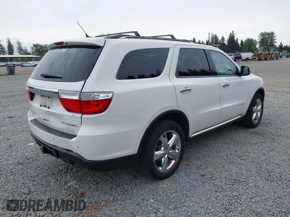 2012 Dodge Durango Citadel with VIN 1C4RDJEG8CC336957, listed as a IAAI auction lot 42309501 with 196,610 mi miles and . Bid and sale history available at DreamBid. Image 4.