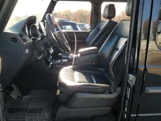 2015 Mercedes-Benz G 550 with VIN WDCYC3HF4FX239064, listed as a Copart auction lot 77151664 with 65,854 mi miles and Salvage Title. Bid and sale history available at DreamBid. Image 7.