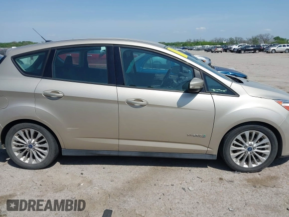 2017 Ford C-Max SE z VIN 1FADP5AU7HL117831, wystawiony jako IAAI lot #42034045 z przebiegiem 124 014 mil mil oraz . Historia ofert i sprzedaży dostępna na DreamBid. Obrazek 13.