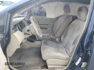 2009 Nissan Versa SL z VIN 3N1BC13E99L381539, wystawiony jako Copart lot #80959644 z przebiegiem 186 390 mil mil oraz Szkoda całkowita • Salvage title. Historia ofert i sprzedaży dostępna na DreamBid. Obrazek 7.