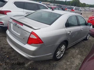 2012 Ford Fusion SEL z VIN 3FAHP0JA4CR191566, wystawiony jako IAAI lot #42358149 z przebiegiem 141 929 mil mil oraz . Historia ofert i sprzedaży dostępna na DreamBid. Obrazek 4.
