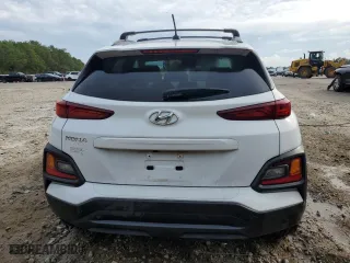 2021 Hyundai Kona SEL with VIN KM8K22AA1MU630349, listed as a Copart auction lot 73941114 with 71,557 mi miles and Salvage Title. Bid and sale history available at carsss.com. Image 6.