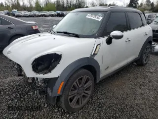 2012 MINI Countryman S with VIN WMWZC5C5XCWL55579, listed as a Copart auction lot 47970695 with 136,015 mi miles and Salvage Title. Bid and sale history available at DreamBid. Image 1.