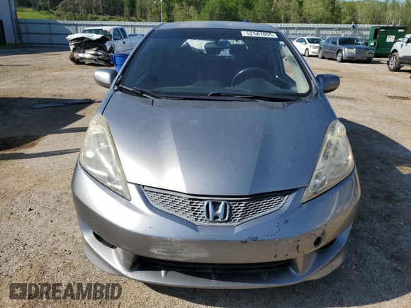 2009 Honda Fit Sport с VIN JHMGE88459S048194, выставлен на аукционе Copart как лот 52581055 с пробегом 177 290 миль миль и Списание • Salvage title. История ставок и продаж доступна на DreamBid. Изображение 5.