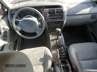 2001 Chevrolet Tracker LT z VIN 2CNBJ634716945832, wystawiony jako Copart lot #61967345 z przebiegiem 136 403 mil mil oraz Szkoda całkowita • Salvage title. Historia ofert i sprzedaży dostępna na DreamBid. Obrazek 8.