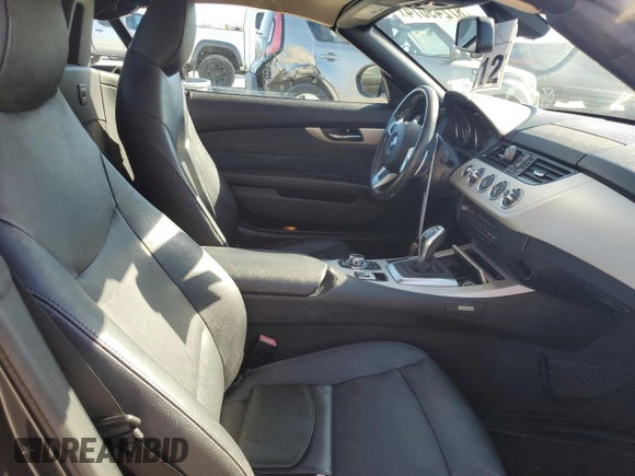 2015 BMW Z4 sDrive28i with VIN WBALL5C54FP557726, listed as a Copart auction lot 87249074 with 64,856 mi miles and Salvage Title. Bid and sale history available at carsss.com. Image 10.
