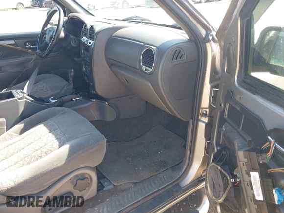2003 GMC Envoy SLE with VIN 1GKDS13S532176330, listed as a IAAI auction lot 41757554 with 274,878 mi miles. Bid and sale history available at carsss.com. Image 5.