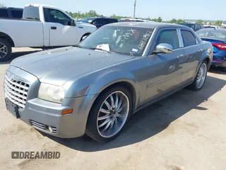 2006 Chrysler 300 Touring with VIN 2C3KA53G06H172162, listed as a IAAI auction lot 42005963 with 209,549 mi miles. Bid and sale history available at carsss.com. Image 2.