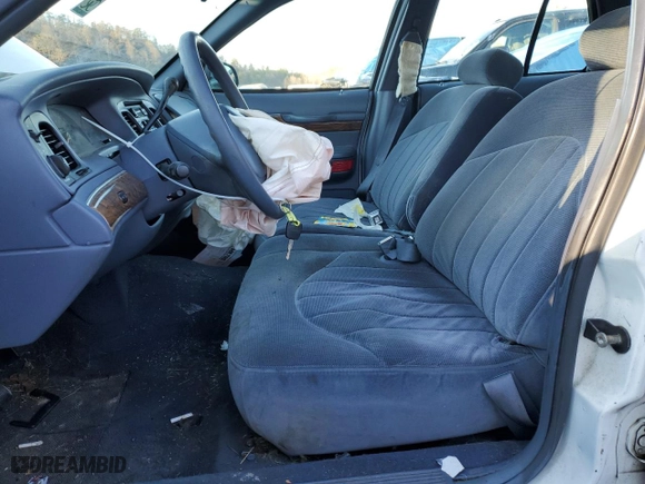 1998 Mercury Grand Marquis GS with VIN 2MEFM74WXWX619140, listed as a Copart auction lot 77300894 with 124,064 mi miles and Salvage Title. Bid and sale history available at carsss.com. Image 7.