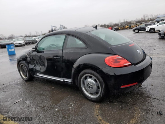 2012 Volkswagen Beetle 2.5L w/Sun/Sound/Nav PZEV with VIN 3VWJP7AT3CM642390, listed as a Copart auction lot 83999924 with 103,884 mi miles and Salvage Title. Bid and sale history available at carsss.com. Image 2.