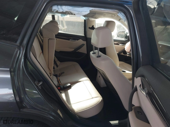 2013 BMW X1 28i with VIN WBAVM1C57DVW42096, listed as a IAAI auction lot 41572971 with 156,999 mi miles. Bid and sale history available at carsss.com. Image 8.