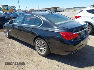 2012 BMW 7 Series 750i with VIN WBAKA8C50CCY37892, listed as a IAAI auction lot 42080313 with 148,058 mi miles. Bid and sale history available at carsss.com. Image 3.