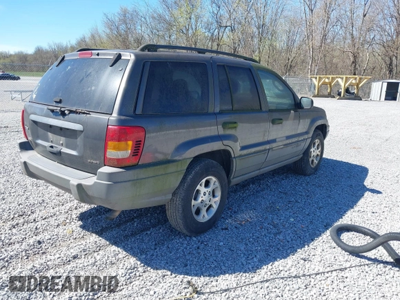 2002 Jeep Grand Cherokee z VIN 1J4GX38S92C149908, wystawiony jako IAAI lot #41782530 z przebiegiem 145 195 mil mil oraz . Historia ofert i sprzedaży dostępna na DreamBid. Obrazek 4.