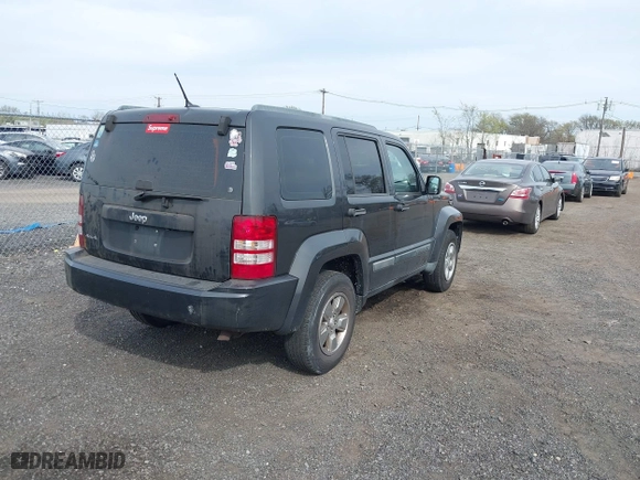2011 Jeep Liberty Sport with VIN 1J4PN2GK2BW581496, listed as a IAAI auction lot 42080245 with 171,626 mi miles. Bid and sale history available at carsss.com. Image 4.