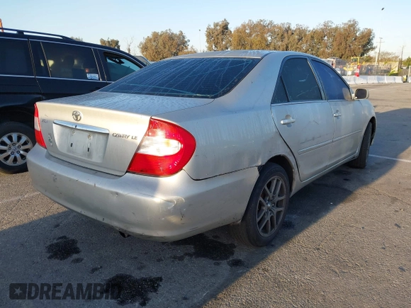 2004 Toyota Camry LE with VIN 4T1BE32K34U307084, listed as a IAAI auction lot 41960265 with 249,222 mi miles. Bid and sale history available at carsss.com. Image 4.
