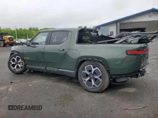2023 Rivian R1T Adventure z VIN 7FCTGAAA5PN019737, wystawiony jako Copart lot #57290475 z przebiegiem Nie podano mil oraz Nie do naprawy. Historia ofert i sprzedaży dostępna na DreamBid. Obrazek 2.