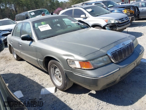 2001 Mercury Grand Marquis LS with VIN 2MEFM75W21X664449, listed as a IAAI auction lot 41898463 with 290,047 mi miles and . Bid and sale history available at DreamBid. Image 1.