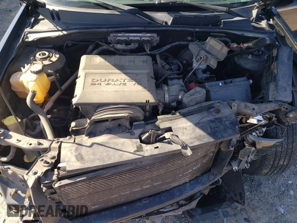 2011 Mercury Mariner Premier with VIN 4M2CN8HG3BKJ00612, listed as a Copart auction lot 53490645 with 154,119 mi miles and Salvage title. Bid and sale history available at DreamBid. Image 13.