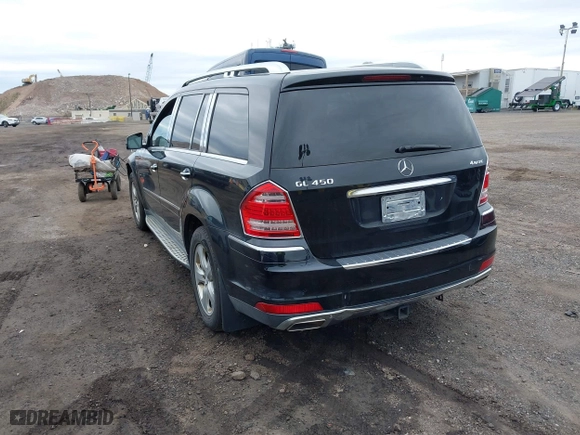 2012 Mercedes-Benz GL-Class GL 450 with VIN 4JGBF7BE9CA763928, listed as a IAAI auction lot 42092738 with 168,971 mi miles. Bid and sale history available at carsss.com. Image 3.