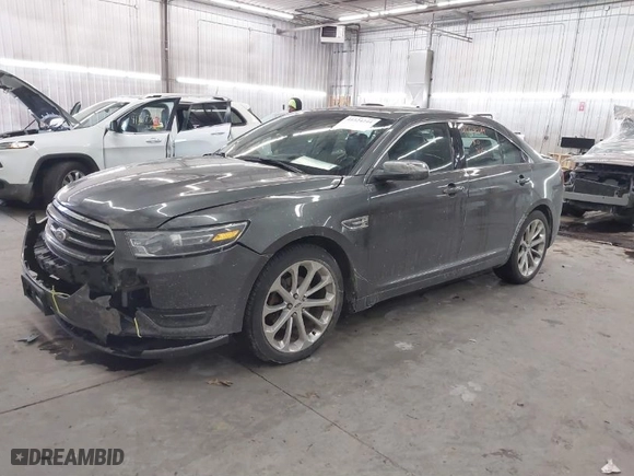 2015 Ford Taurus Limited with VIN 1FAHP2J8XFG192225, listed as a IAAI auction lot 41324244 with 100,395 mi miles. Bid and sale history available at carsss.com. Image 2.