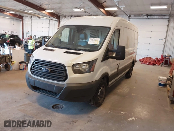 2018 Ford Transit z VIN 1FTBW2CM7JKA87273, wystawiony jako IAAI lot #42240277 z przebiegiem 80 226 mil mil oraz . Historia ofert i sprzedaży dostępna na DreamBid. Obrazek 2.