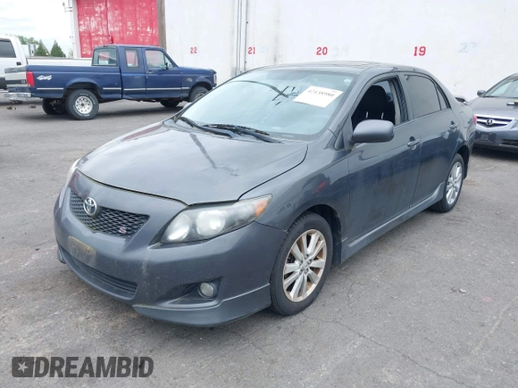 2009 Toyota Corolla with VIN 1NXBU40E39Z065572, listed as a IAAI auction lot 42138980 with 195,822 mi miles. Bid and sale history available at carsss.com. Image 2.
