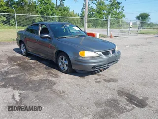 2004 Pontiac Grand Am SE1 with VIN 1G2NF52E24M661686, listed as a IAAI auction lot 42574463 with 214,537 mi miles and . Bid and sale history available at DreamBid. Image 1.