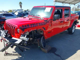 2022 Jeep Gladiator Willys Sport z VIN 1C6HJTAG0NL180848, wystawiony jako IAAI lot #41778129 z przebiegiem Nie podano mil oraz . Historia ofert i sprzedaży dostępna na DreamBid. Obrazek 2.