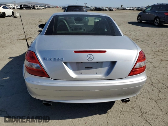 2005 Mercedes-Benz SLK 230/320 with VIN WDBWK56F05F043625, listed as a Copart auction lot 55623625 with 170,798 mi miles and Salvage title. Bid and sale history available at DreamBid. Image 6.