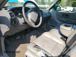 2002 Ford F-150 XL z VIN 1FTRX18LX2NA09494, wystawiony jako Copart lot #55255925 z przebiegiem 331 667 mil mil oraz Szkoda całkowita • Salvage title. Historia ofert i sprzedaży dostępna na DreamBid. Obrazek 8.